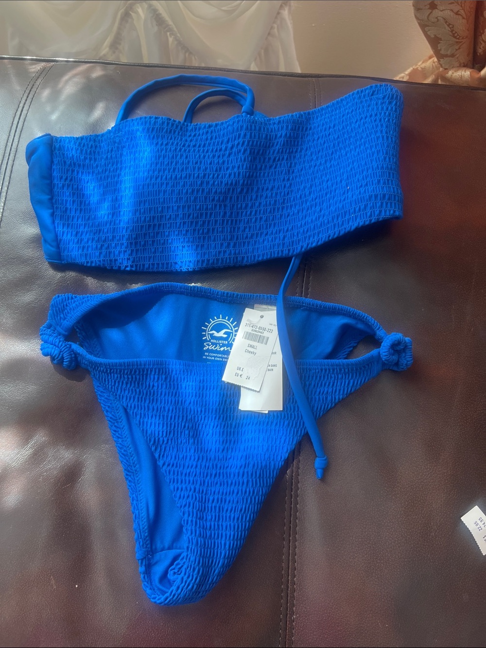 Hollister Bright Blue Smocked Two-Piece Swim Set top size M
Bottom size S
